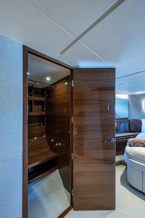 a wood door in a room aboard SPLASH Yacht for Sale