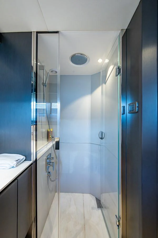 a bathroom with a shower unit aboard SPLASH Yacht for Sale