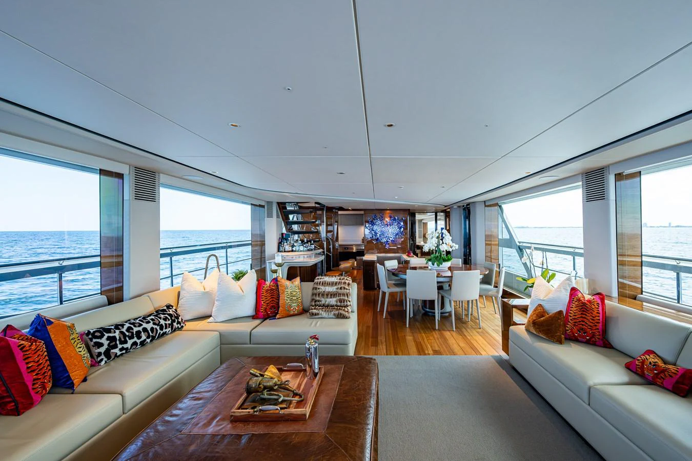 a living room with a large window aboard SPLASH Yacht for Sale