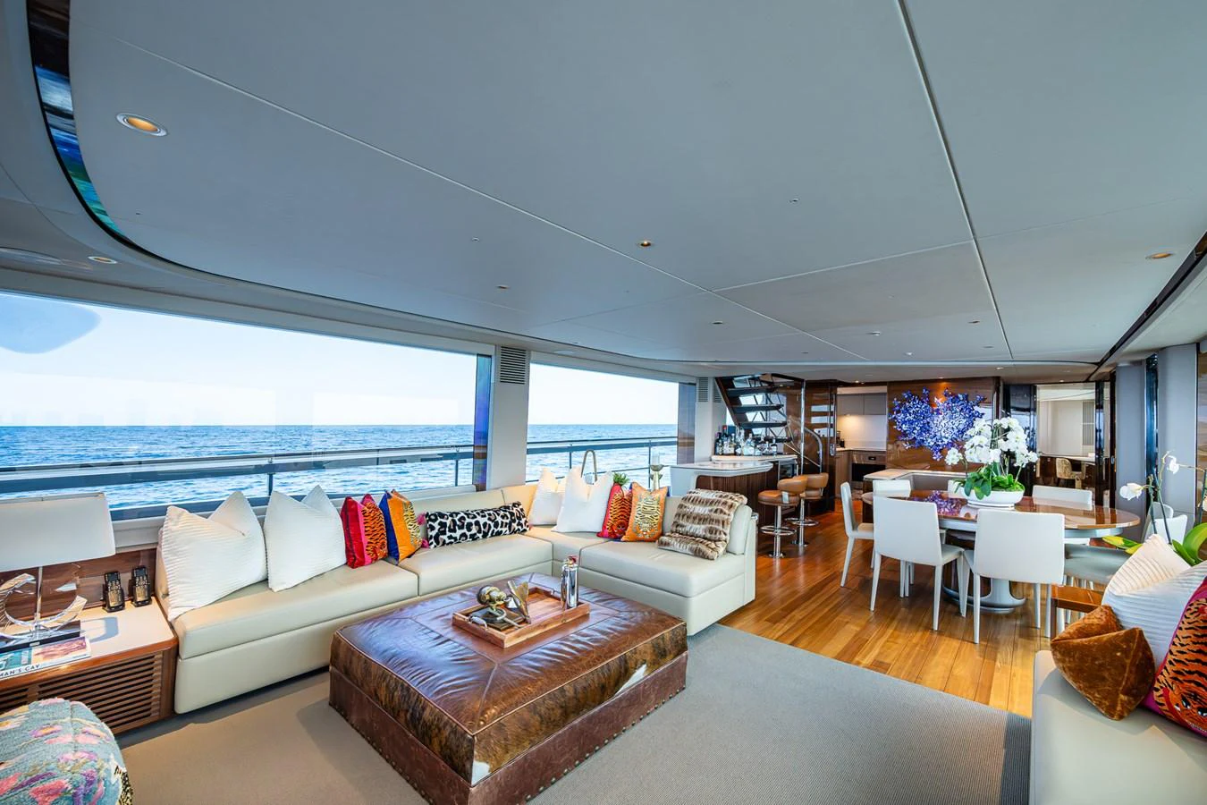 a living room with a large window aboard SPLASH Yacht for Sale