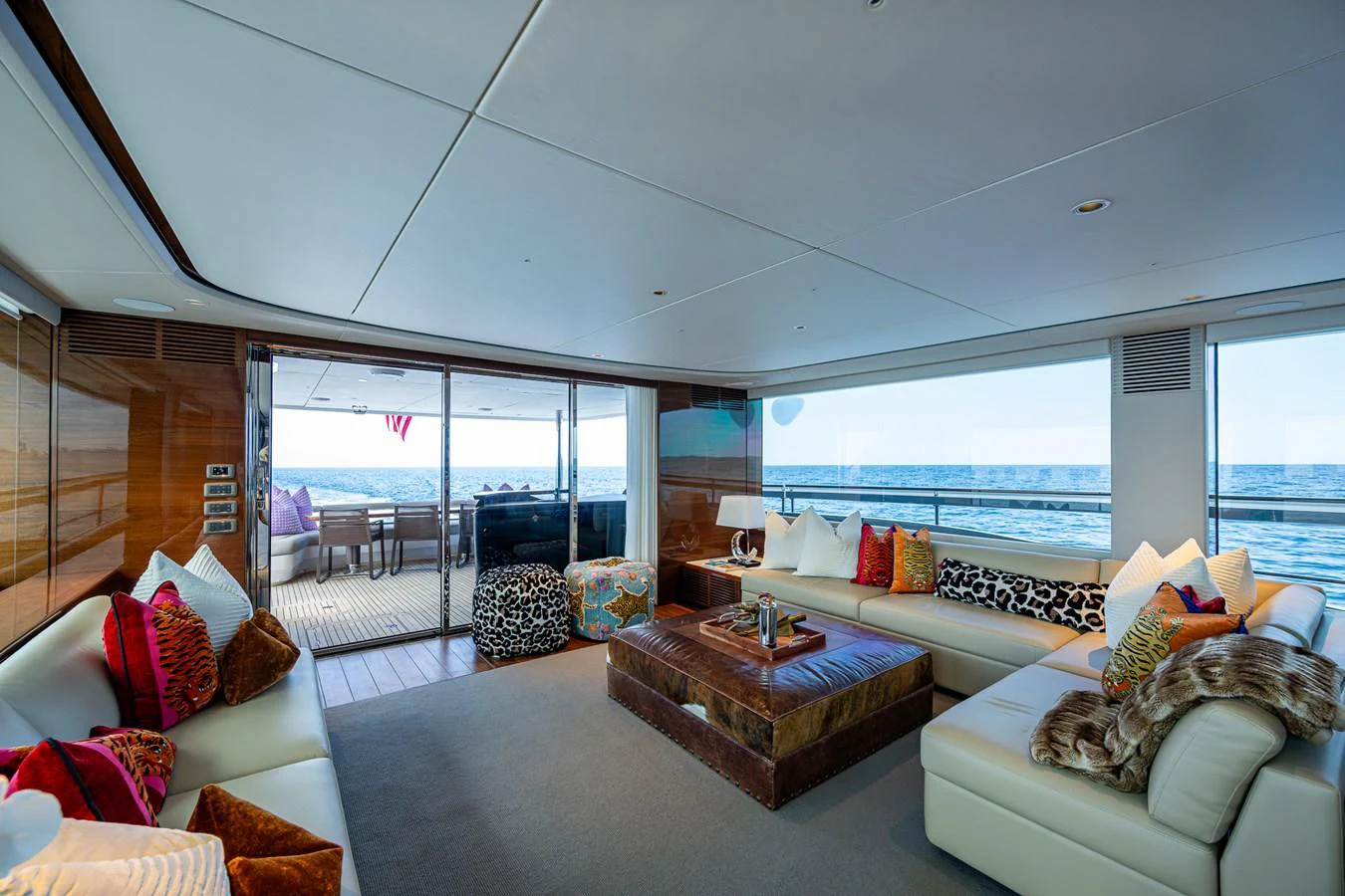 a living room with a large window aboard SPLASH Yacht for Sale