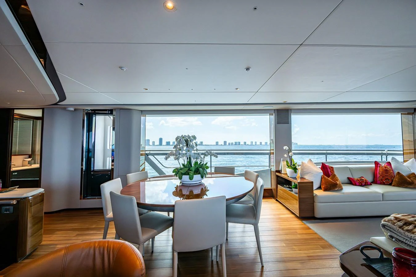 a living room with a large window aboard SPLASH Yacht for Sale