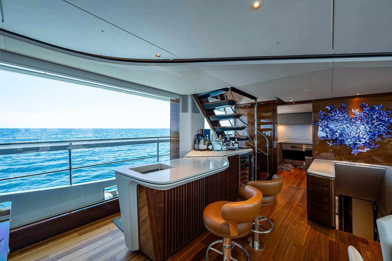 a room with a desk and a window aboard SPLASH Yacht for Sale