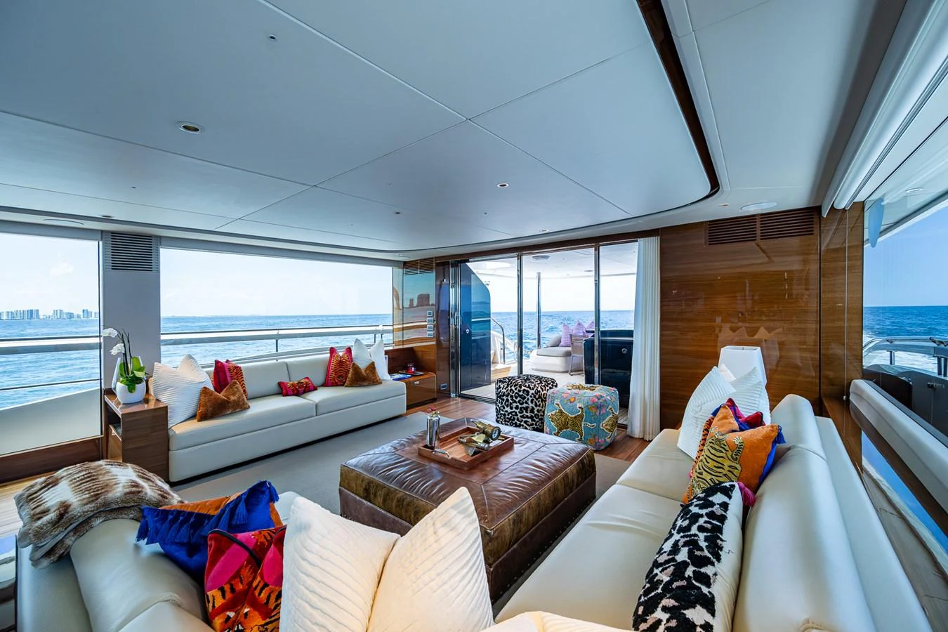 a living room with a large window aboard SPLASH Yacht for Sale