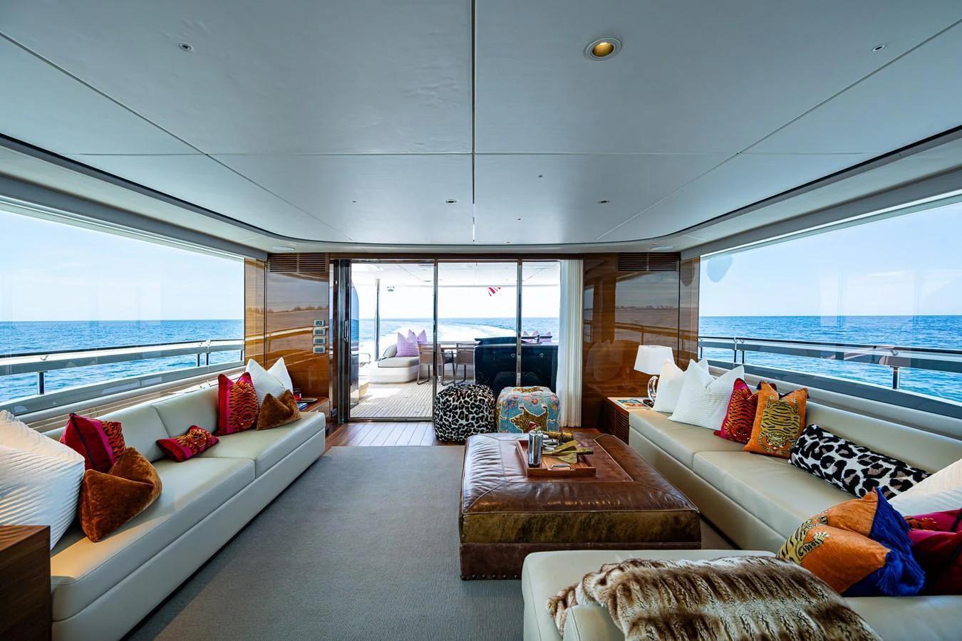 a living room with a large window aboard SPLASH Yacht for Sale