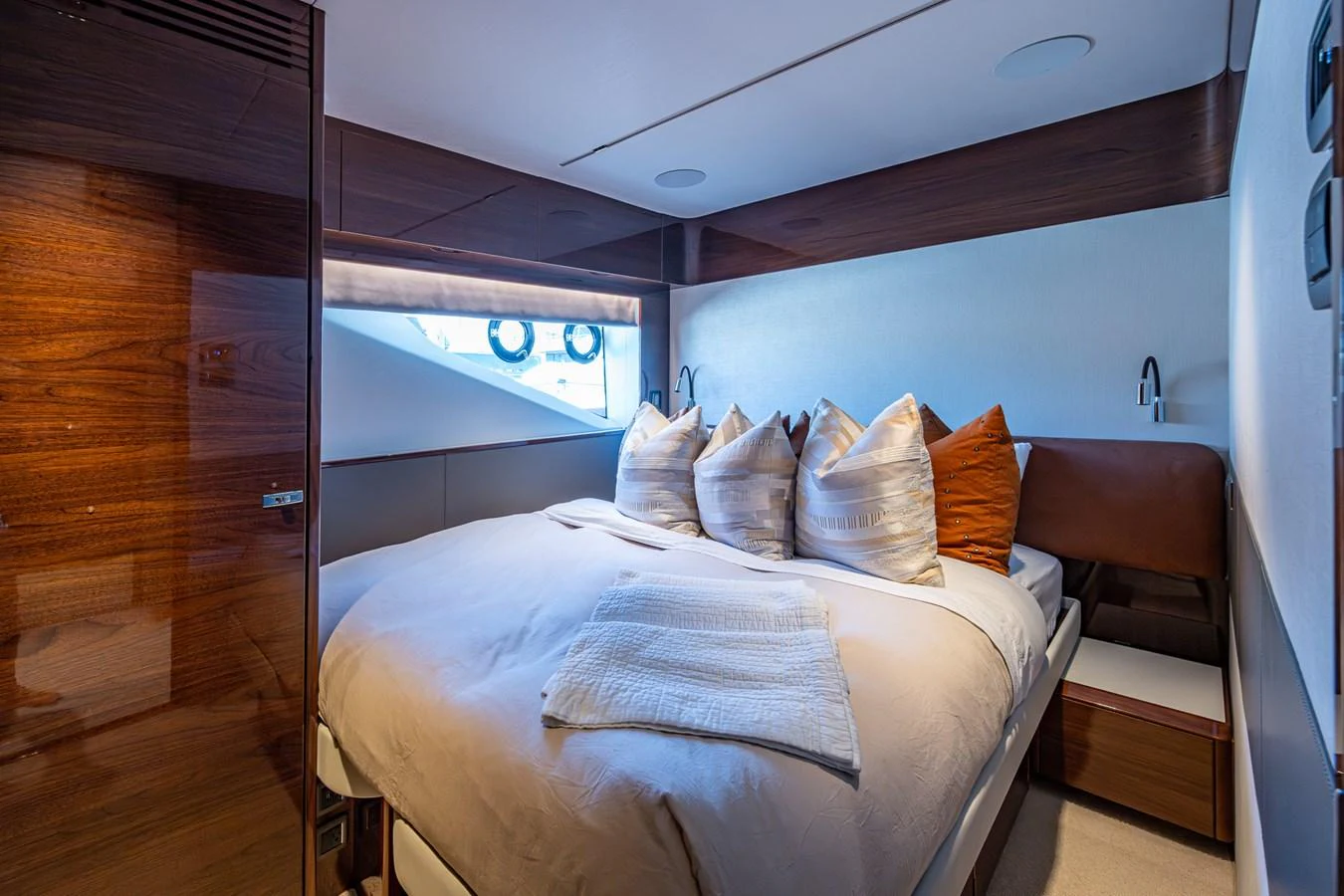 a bed with pillows aboard SPLASH Yacht for Sale