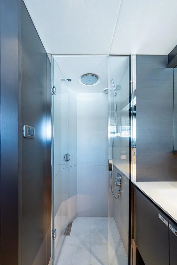 a shower unit in a bathroom aboard SPLASH Yacht for Sale