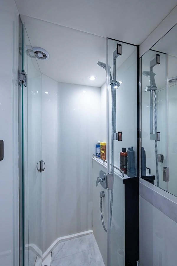 a shower unit with a glass door aboard SPLASH Yacht for Sale