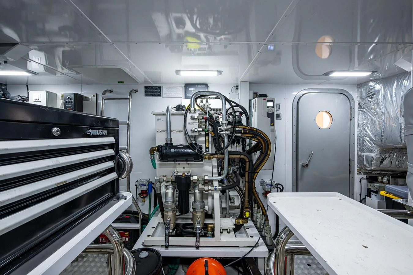 a machine in a room aboard SPLASH Yacht for Sale