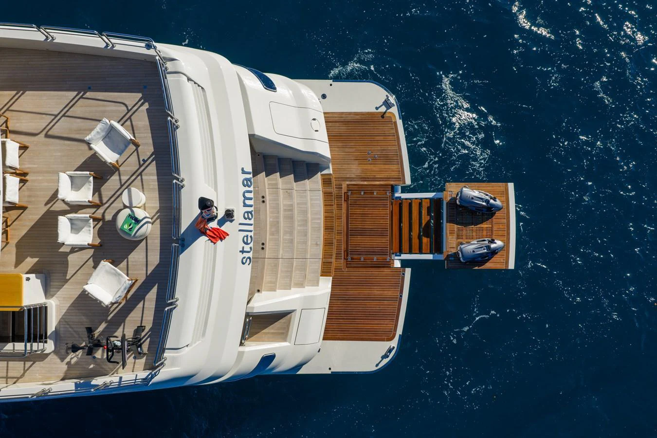 a person standing on a boat aboard STELLAMAR Yacht for Sale