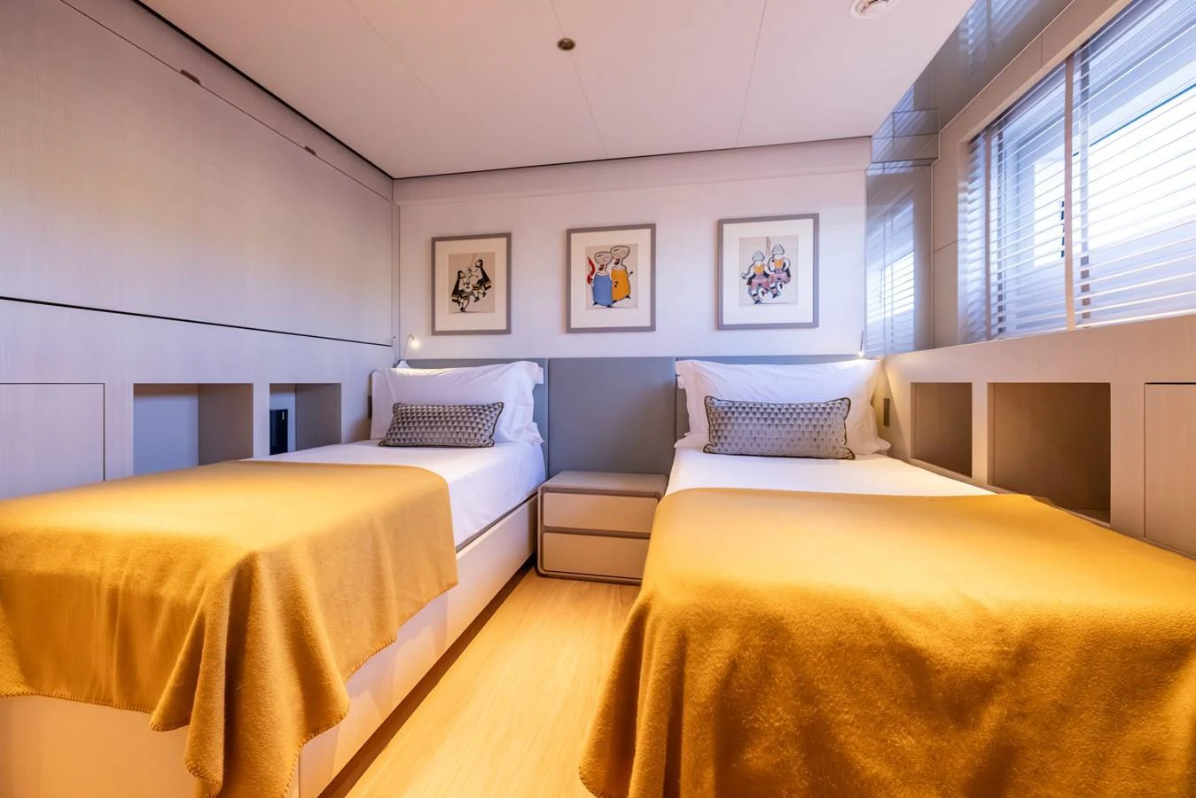 a room with two beds aboard STELLAMAR Yacht for Sale