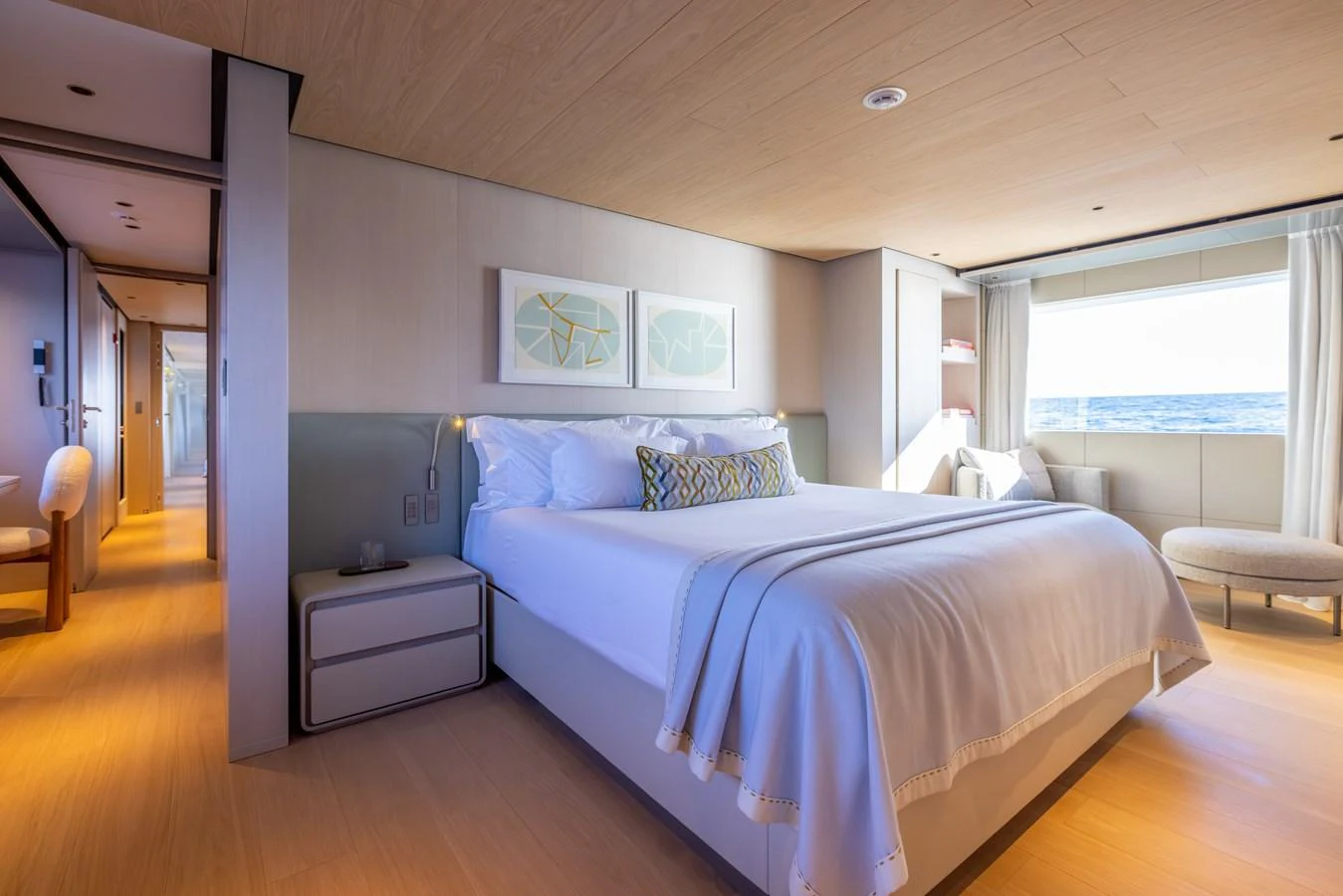 a bedroom with a large bed aboard STELLAMAR Yacht for Sale