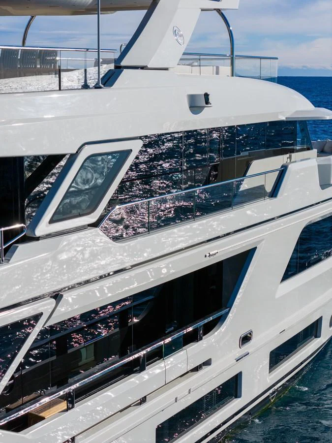 a white yacht with windows aboard STELLAMAR Yacht for Sale