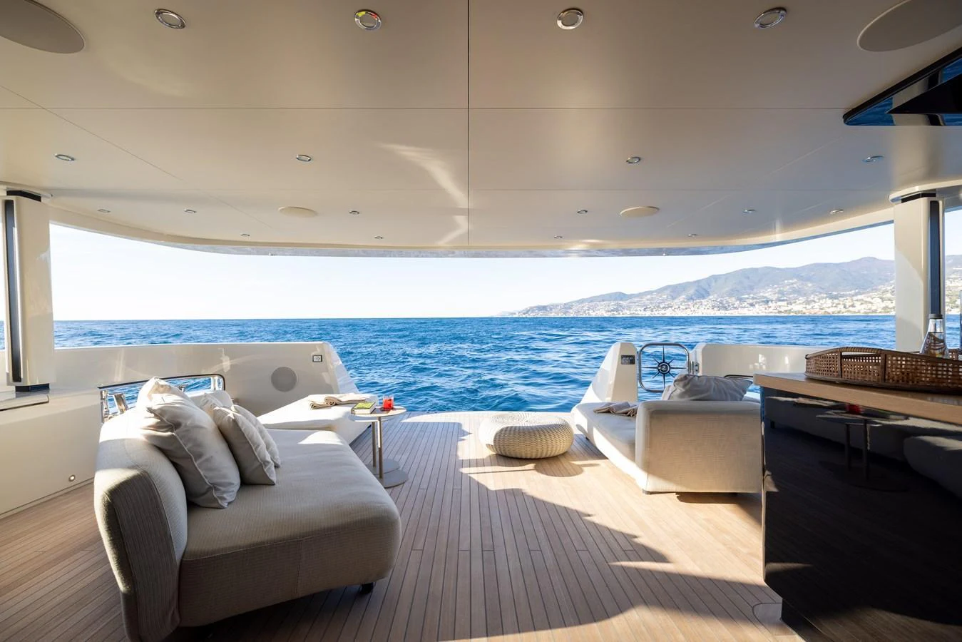a room with a couch and a large body of water aboard STELLAMAR Yacht for Sale