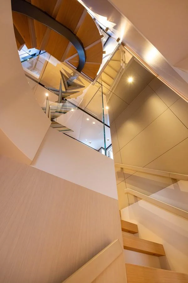 a staircase with a glass ceiling aboard STELLAMAR Yacht for Sale