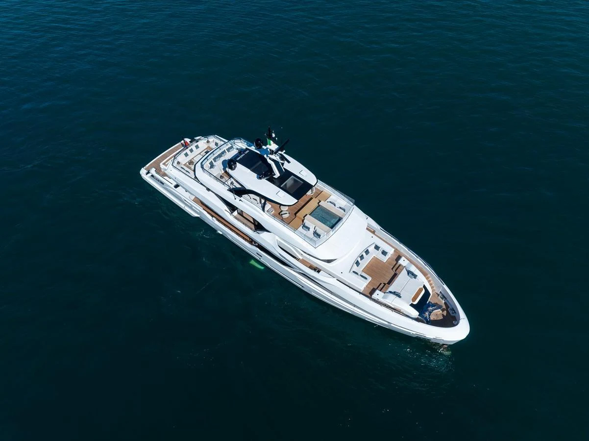 A sleek and modern yacht glides gracefully on the open water, showcasing its luxurious design and spacious decks. aboard ANDALA Yacht for Sale