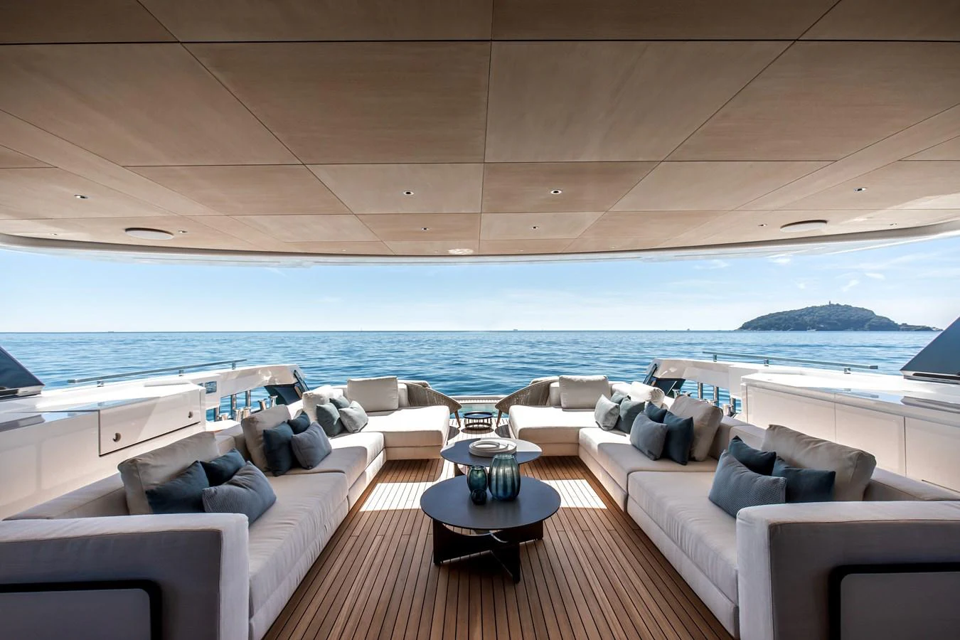 The aft deck offers a spacious and luxurious seating area with stunning ocean views. aboard ANDALA Yacht for Sale