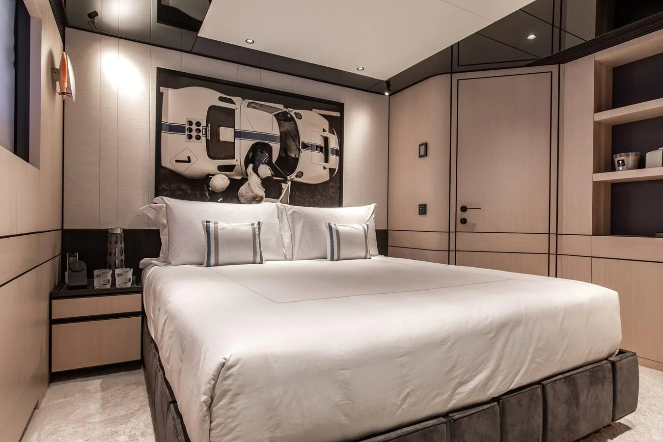 A luxurious stateroom featuring a large bed with elegant decor and modern furnishings. aboard ANDALA Yacht for Sale