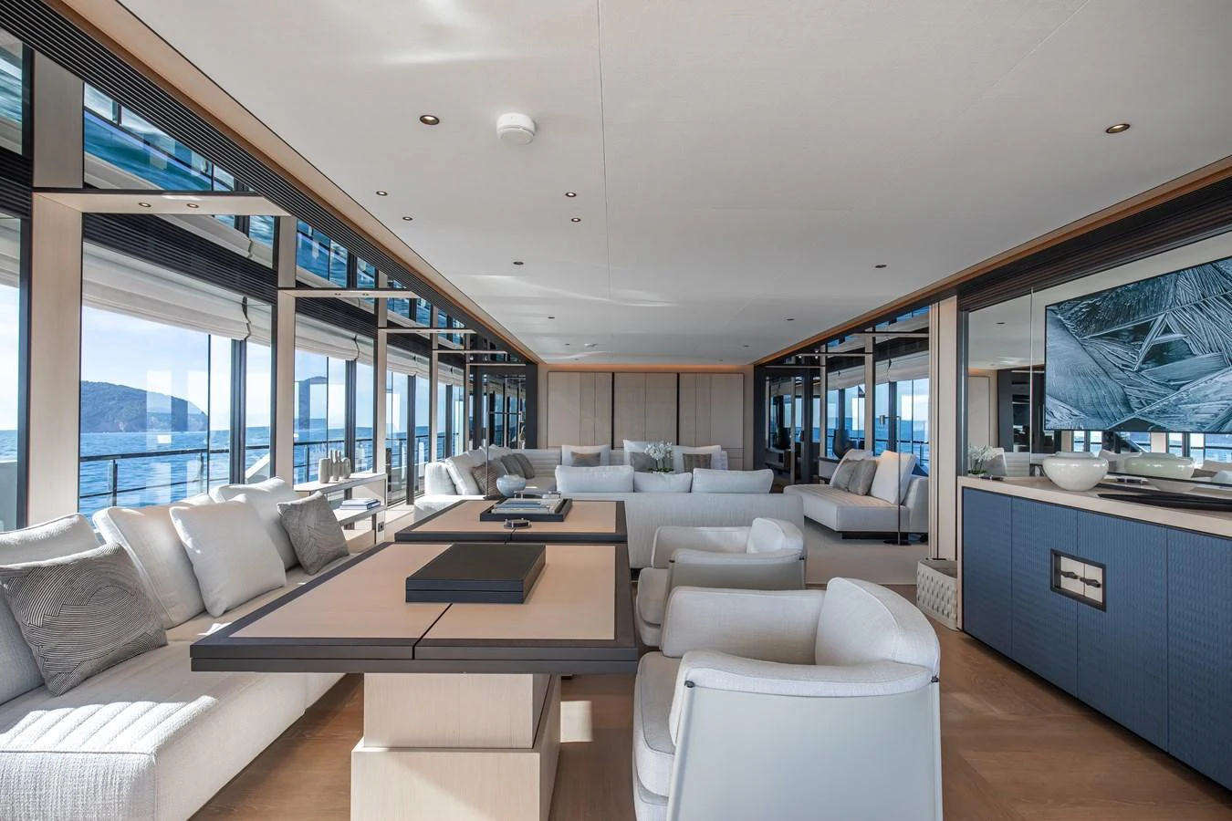 The spacious salon offers panoramic views and luxurious seating arrangements. aboard ANDALA Yacht for Sale