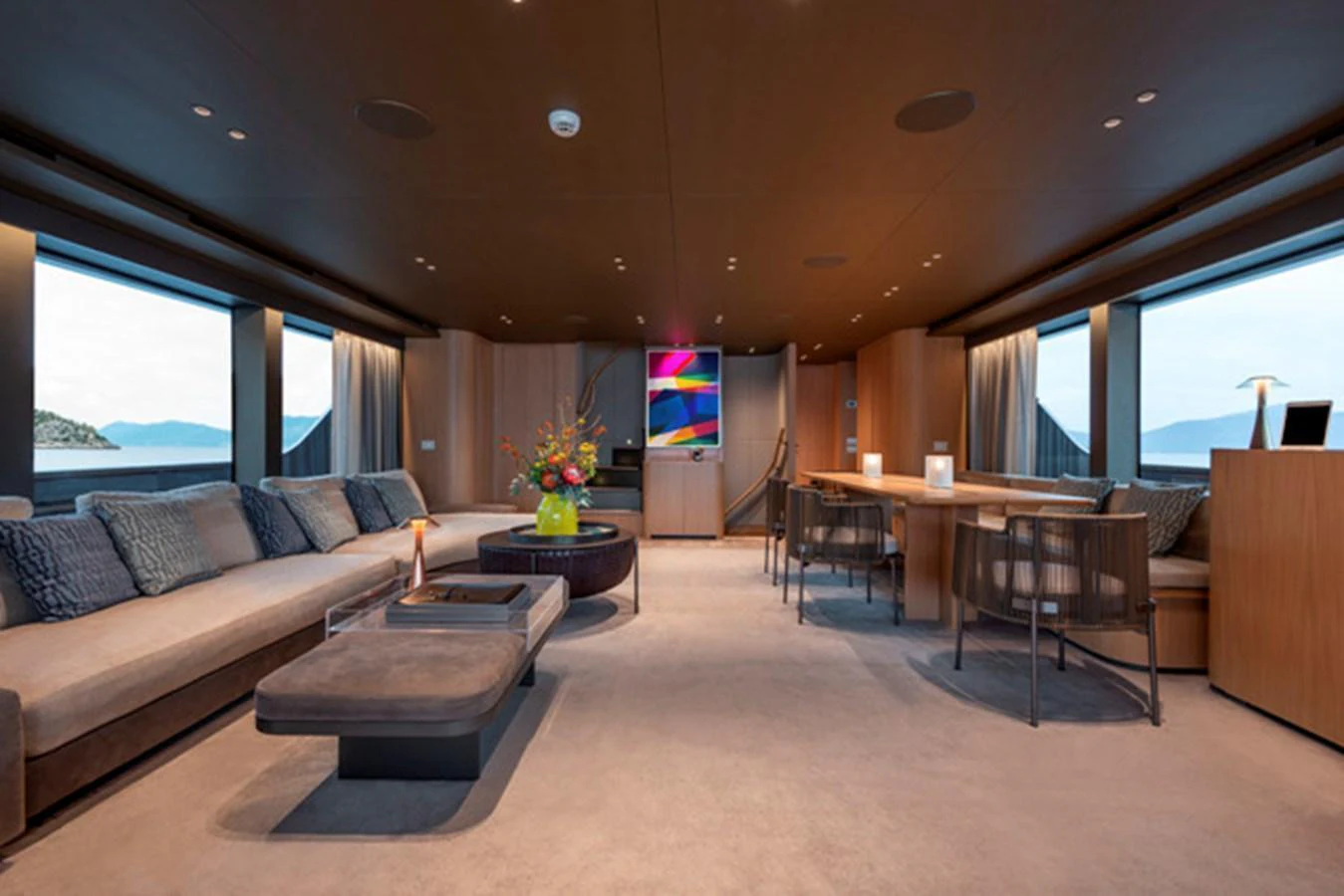The salon features luxurious seating, a modern entertainment system, and panoramic windows offering stunning views. aboard FATSA Yacht for Sale