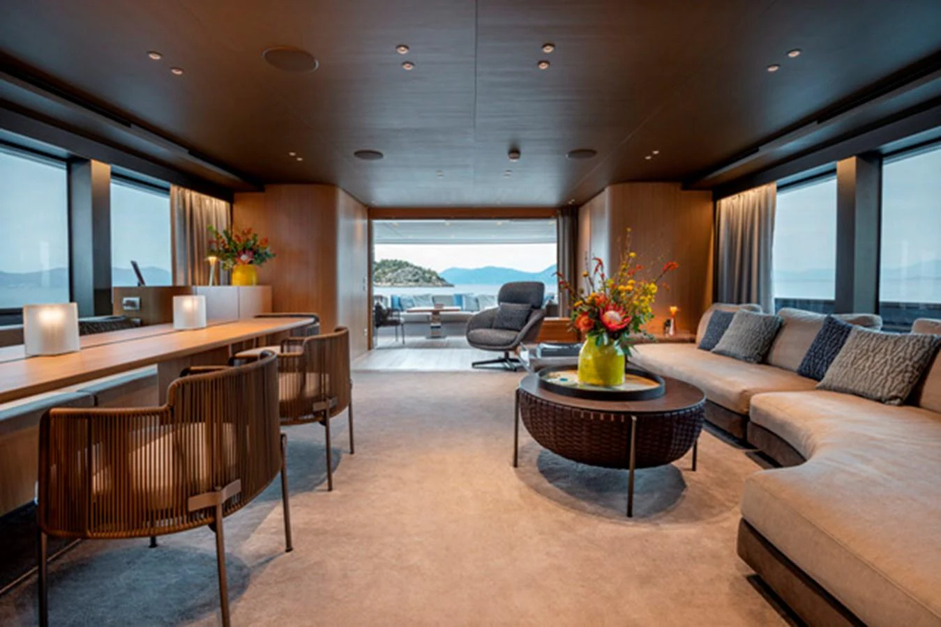 The salon offers a spacious and elegant area with panoramic views and luxurious furnishings. aboard FATSA Yacht for Sale