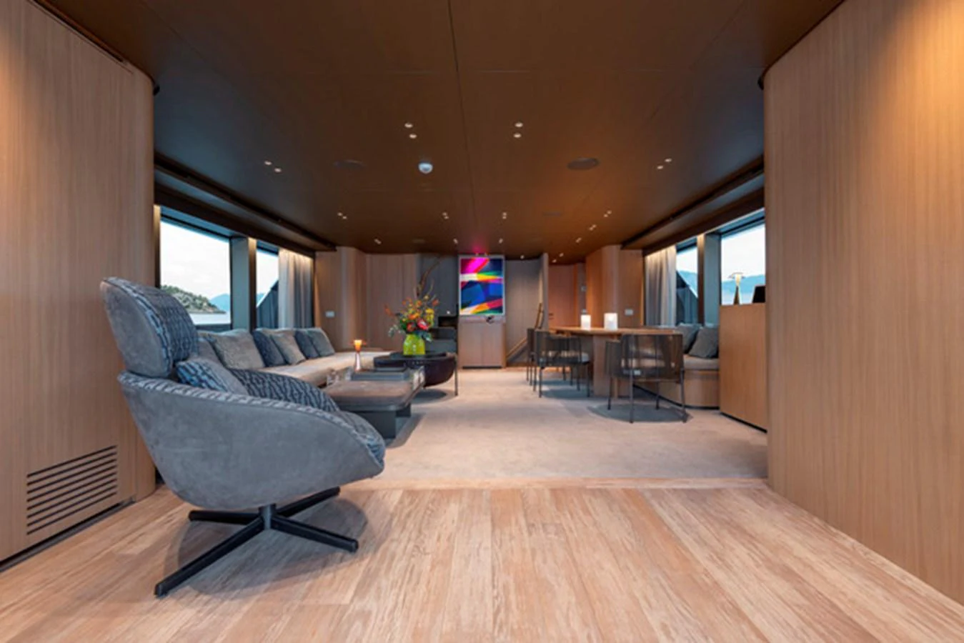 The salon features modern furnishings and ample natural light, creating a welcoming and stylish atmosphere. aboard FATSA Yacht for Sale