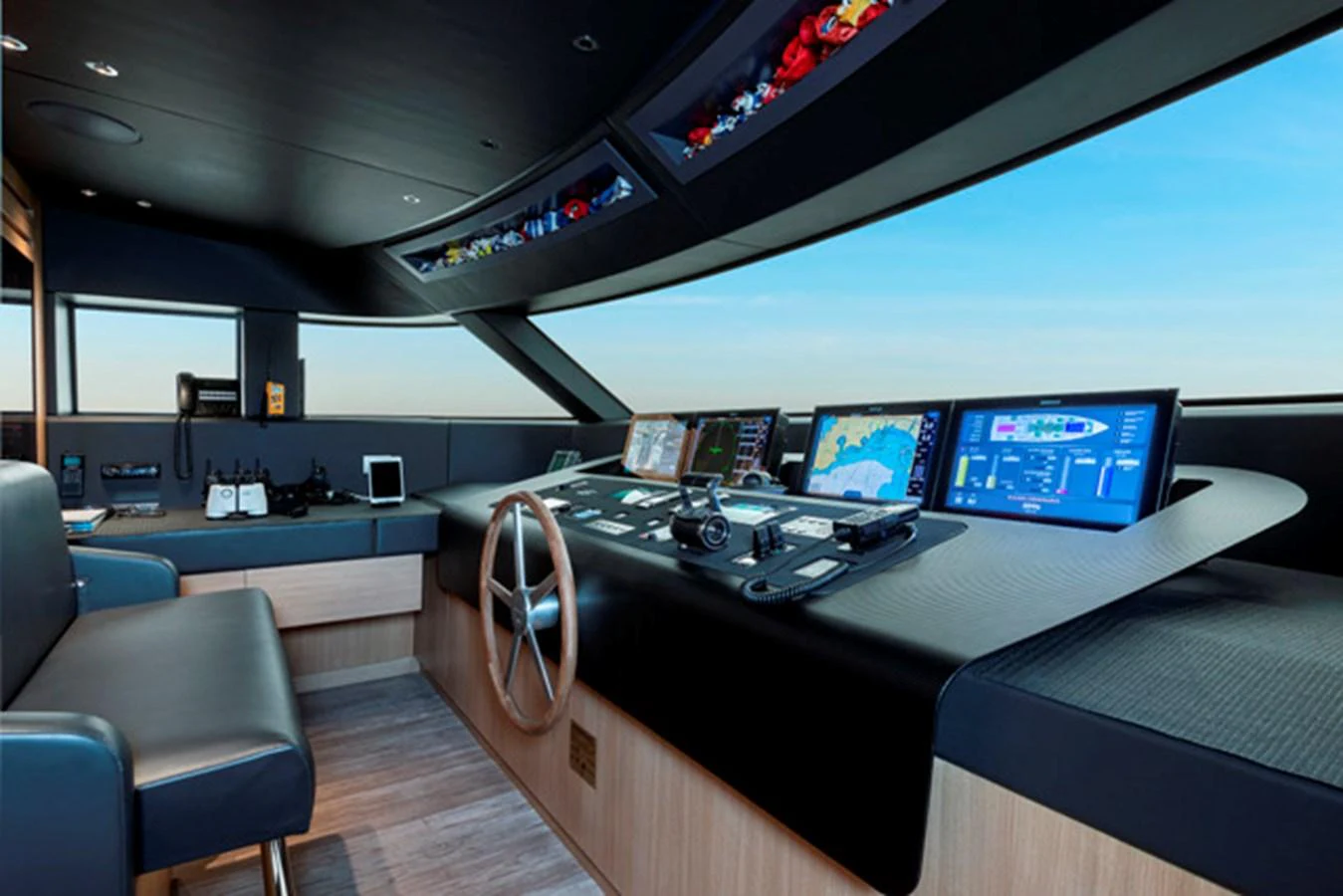 The helm features state-of-the-art navigation equipment and a sleek, modern design. aboard FATSA Yacht for Sale