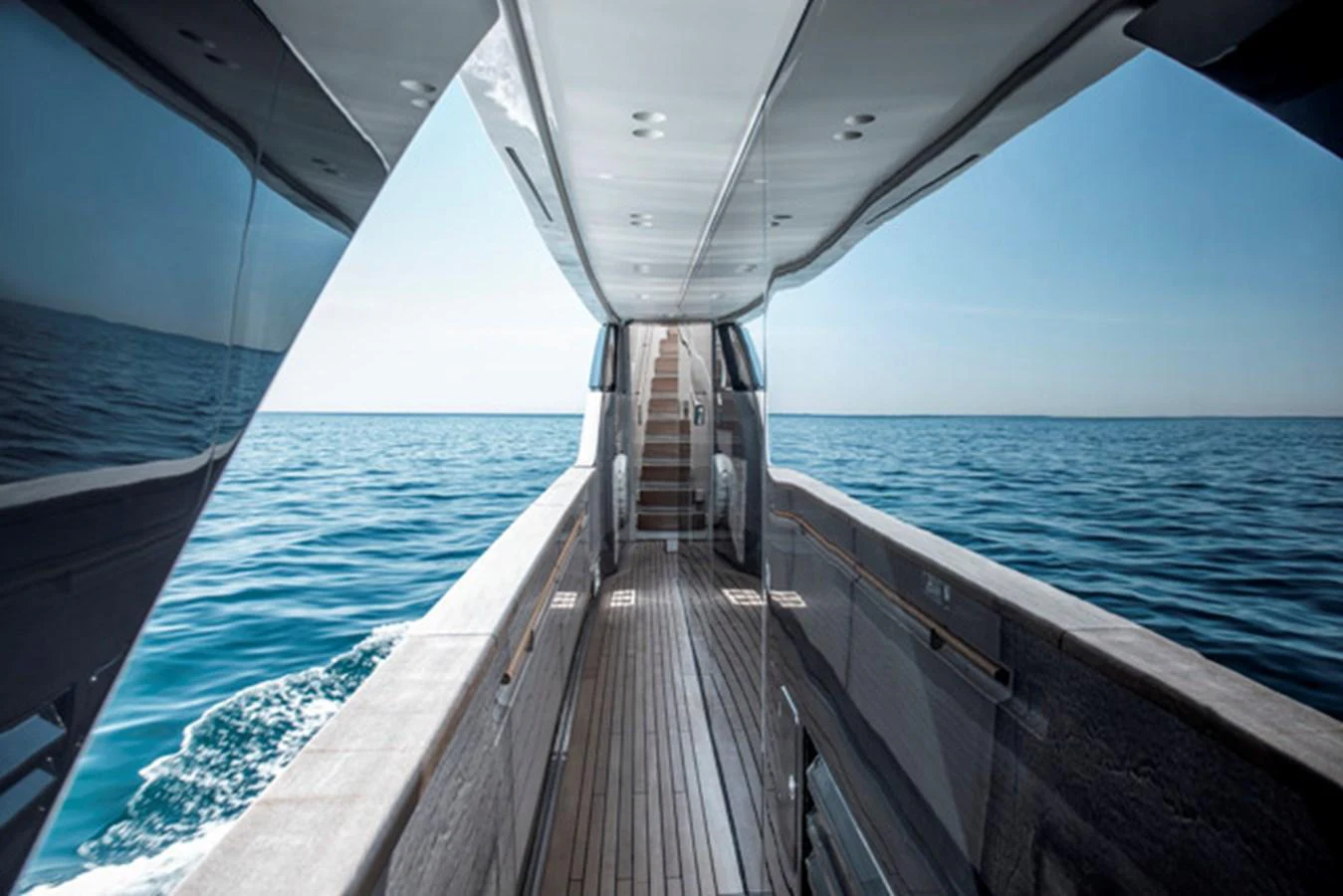 A sleek side deck with a view of the open sea, showcasing the yacht's modern design and luxurious finish. aboard FATSA Yacht for Sale