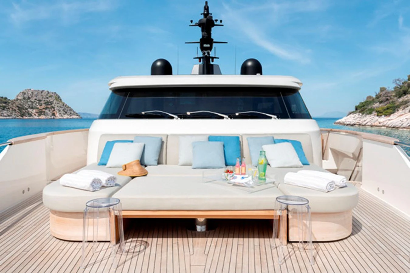 The foredeck features a luxurious sunbathing area with plush cushions and a serene ocean view. aboard FATSA Yacht for Sale