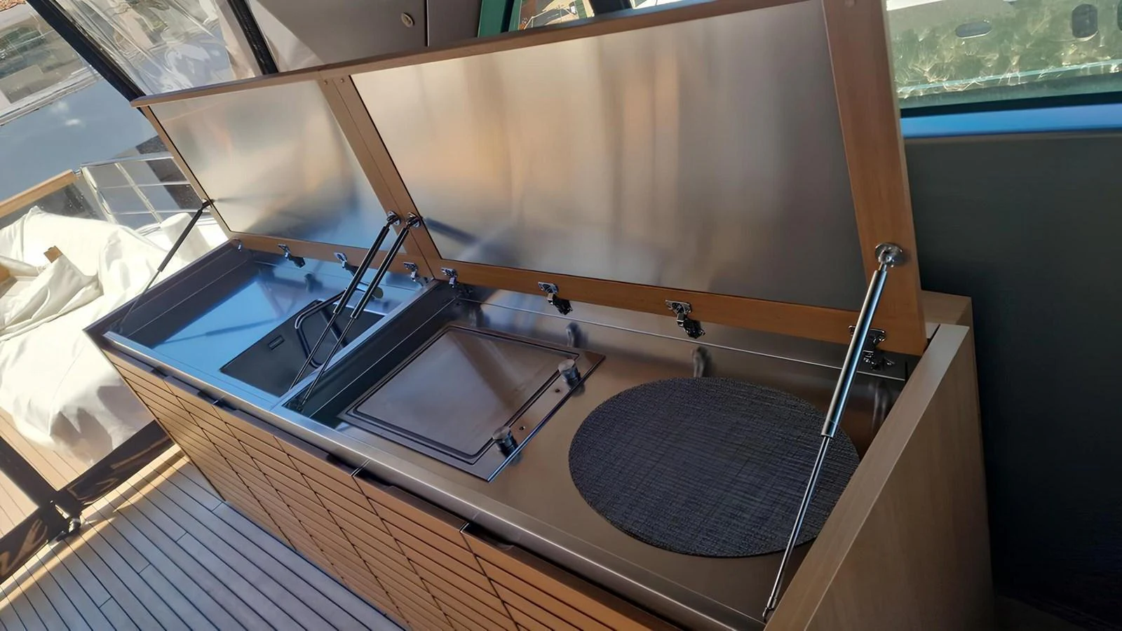 The yacht features a sleek and modern galley with stainless steel surfaces and ample storage. aboard LYDIA Yacht for Sale