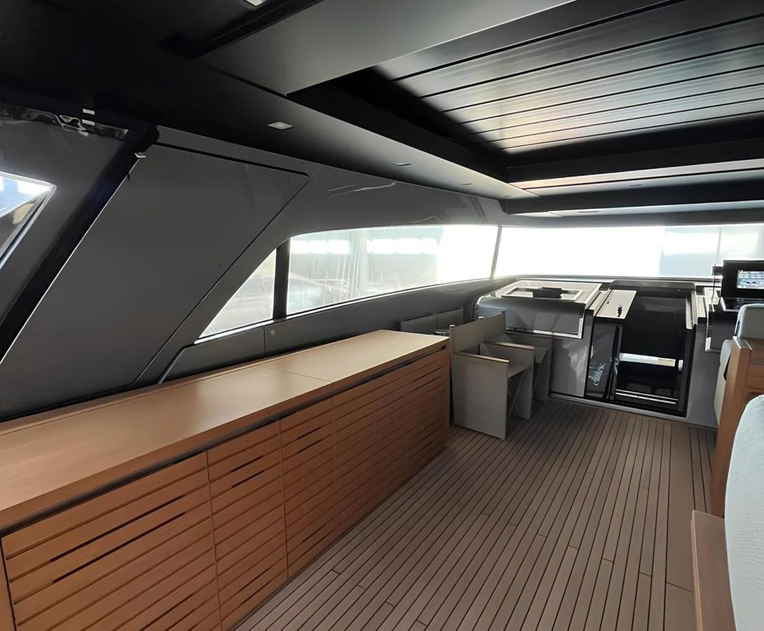 The yacht's interior features a sleek, modern design with ample storage and seating areas. aboard LYDIA Yacht for Sale