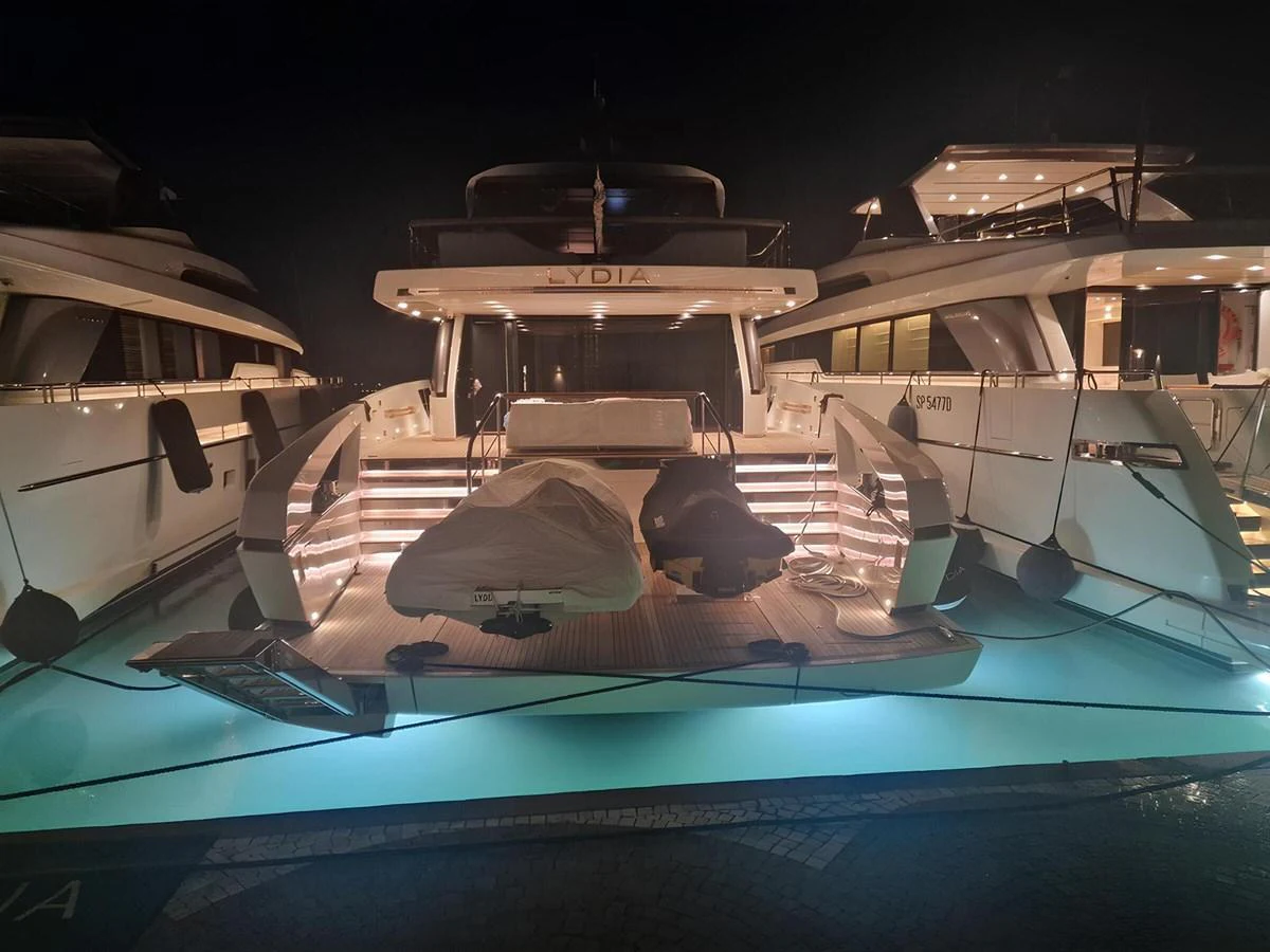 The yacht's illuminated aft deck exudes elegance and sophistication, perfect for evening relaxation. aboard LYDIA Yacht for Sale