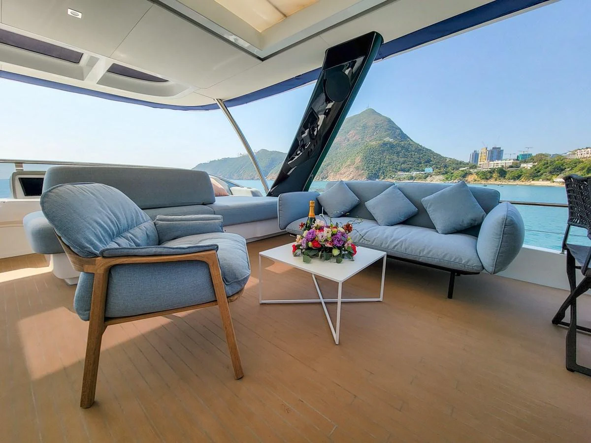 The aft deck offers a comfortable seating area with stunning views of the surrounding landscape. aboard LAGOON SIXTY 7 Yacht for Sale