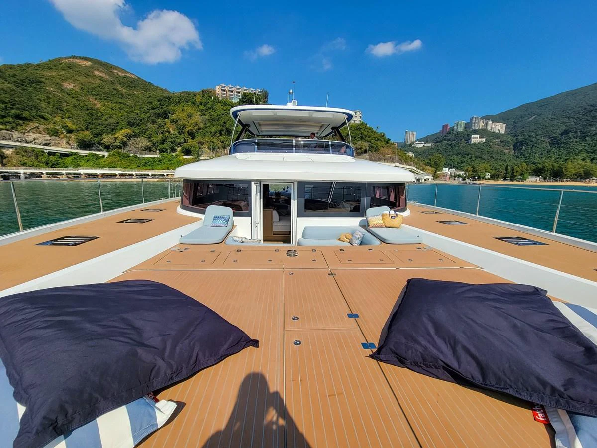 The spacious foredeck offers ample lounging areas with scenic views. aboard LAGOON SIXTY 7 Yacht for Sale