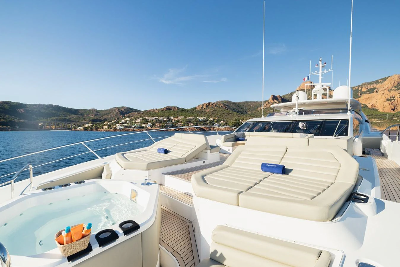 The sundeck features luxurious sun loungers and a jacuzzi, perfect for relaxation with stunning views. aboard KING POWER Yacht for Sale