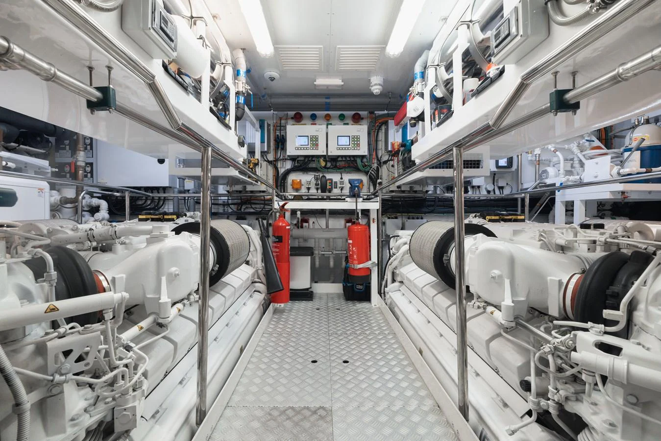 The engine room showcases powerful machinery and meticulous organization. aboard KING POWER Yacht for Sale