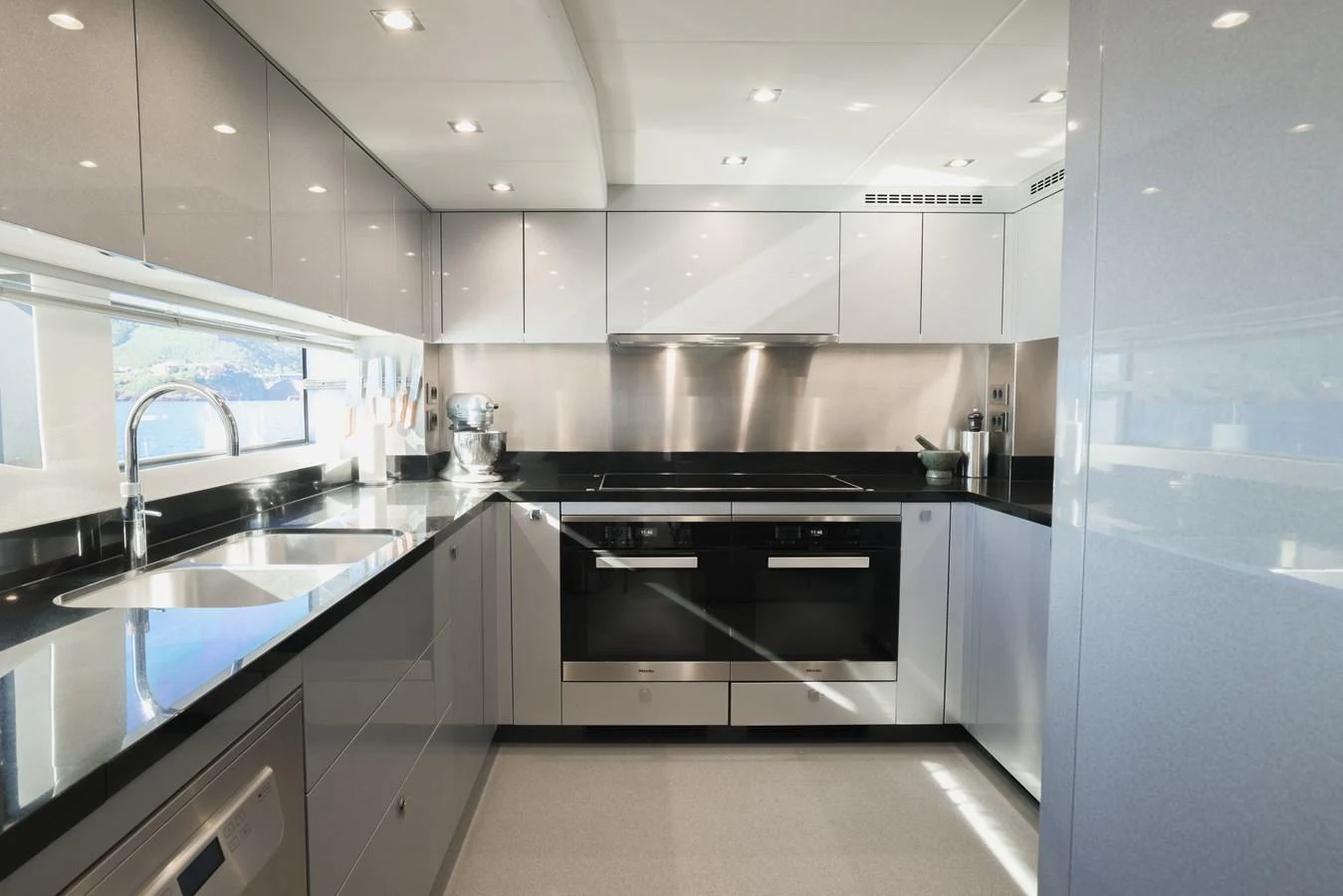 The yacht's galley is sleek and modern, featuring high-end appliances and ample counter space. aboard KING POWER Yacht for Sale
