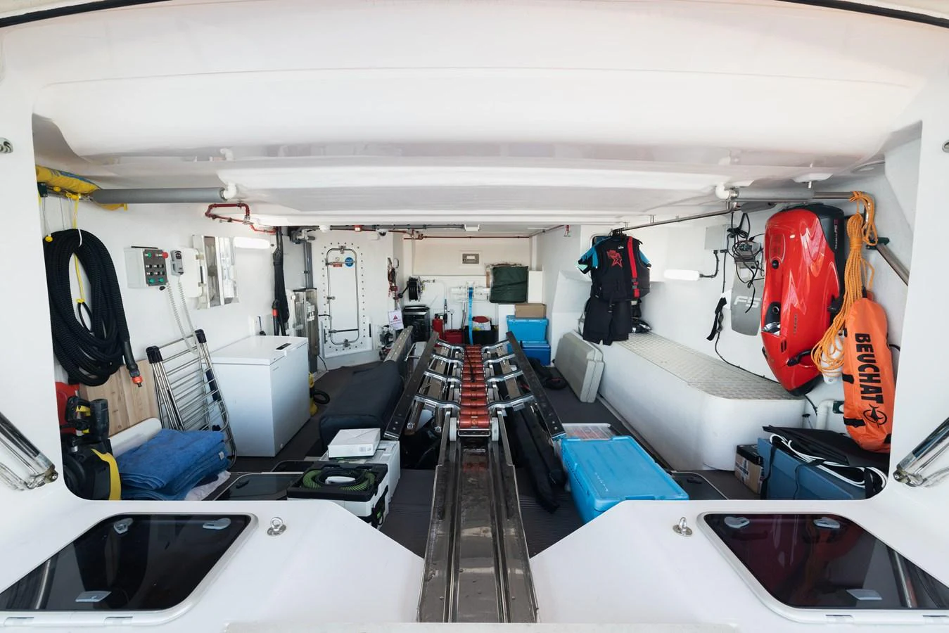 The image showcases the well-organized storage area of the yacht, equipped with various equipment and supplies. aboard KING POWER Yacht for Sale