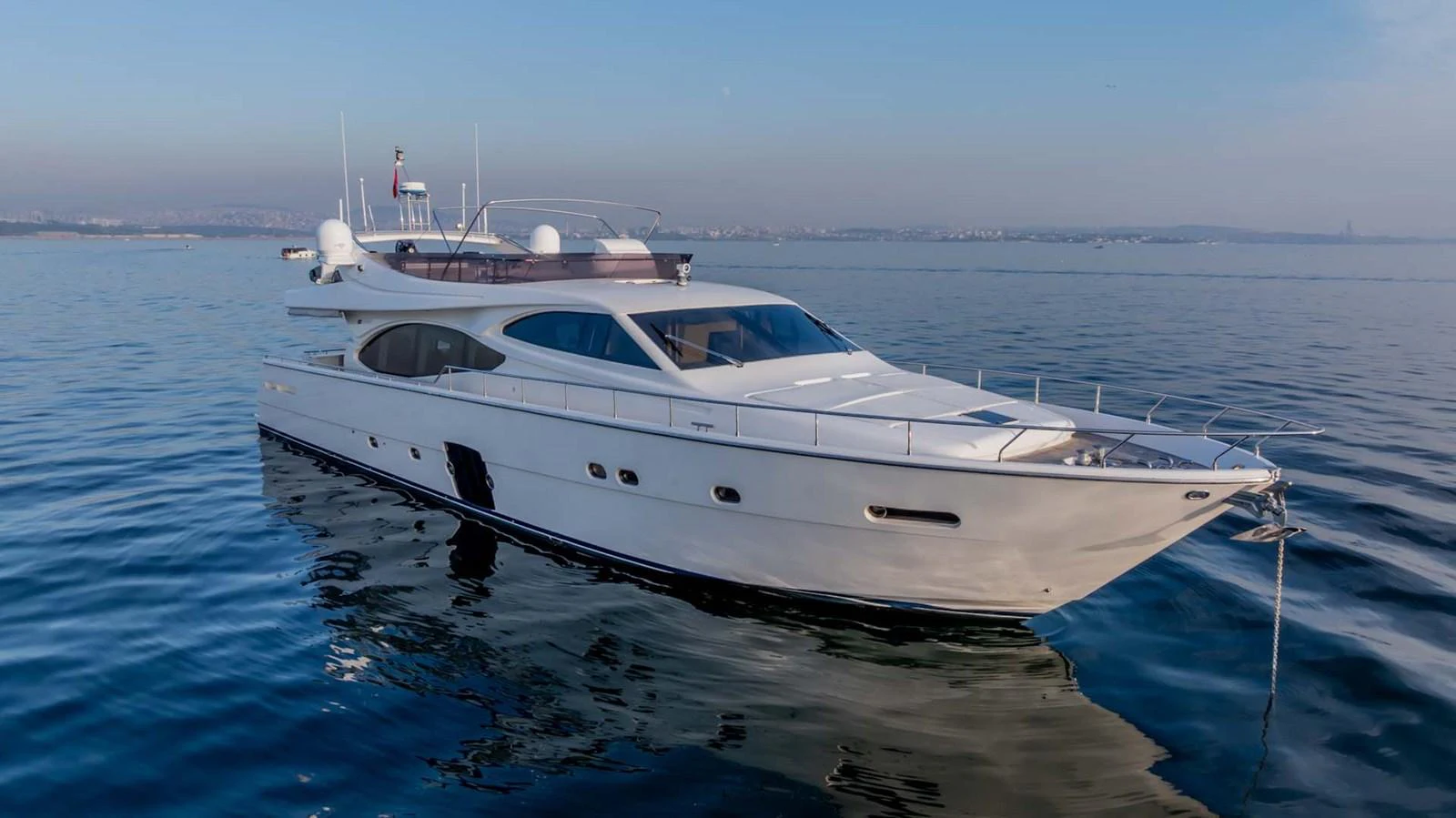 a white yacht on the water aboard STELLINA Yacht for Sale