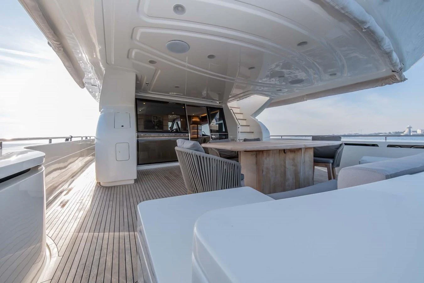a room with a table and chairs aboard STELLINA Yacht for Sale