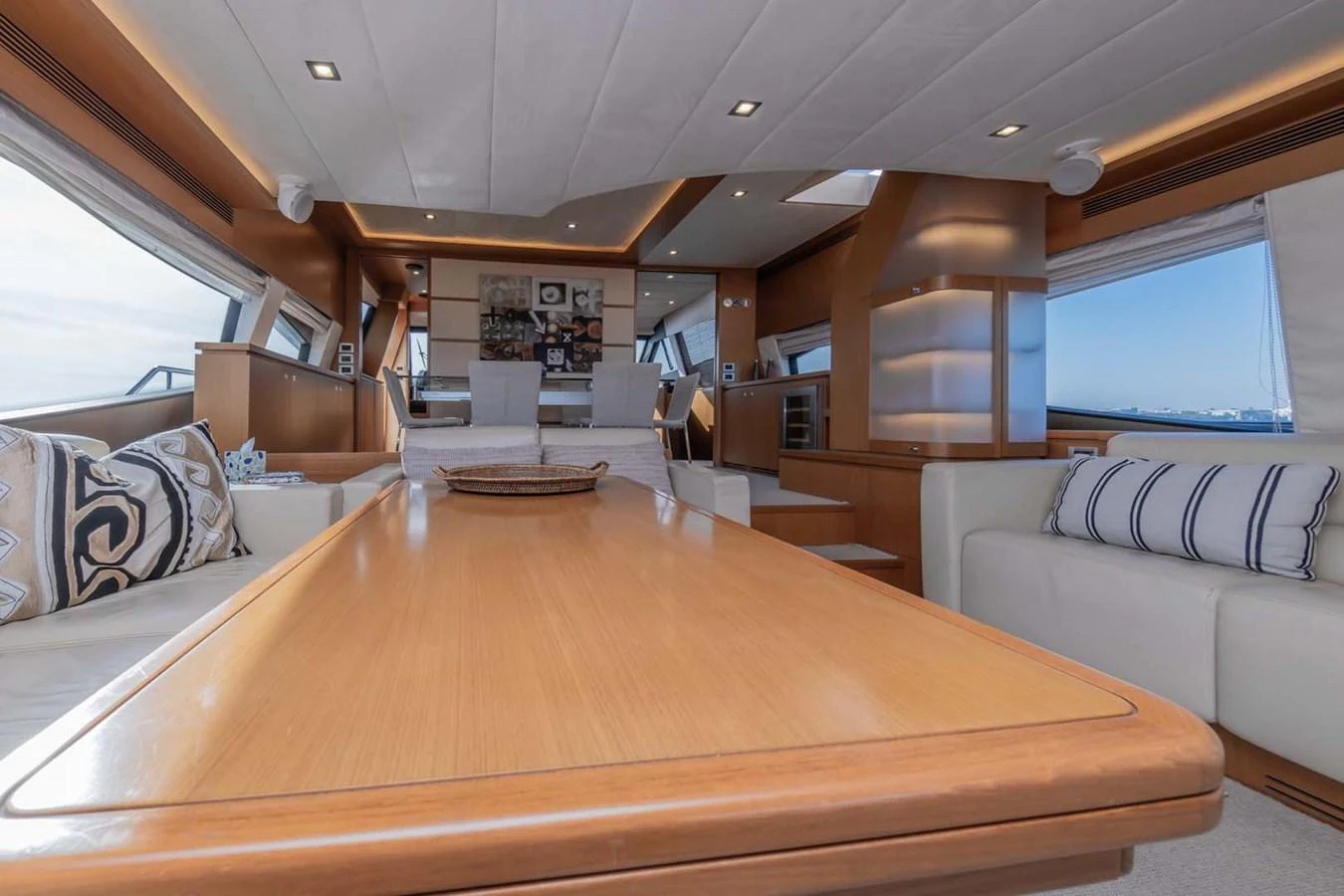 a room with a table and couches aboard STELLINA Yacht for Sale