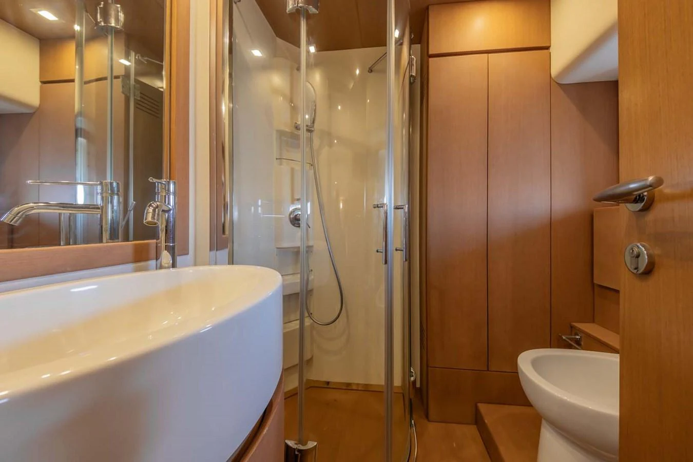 a bathroom with a shower and sink aboard STELLINA Yacht for Sale