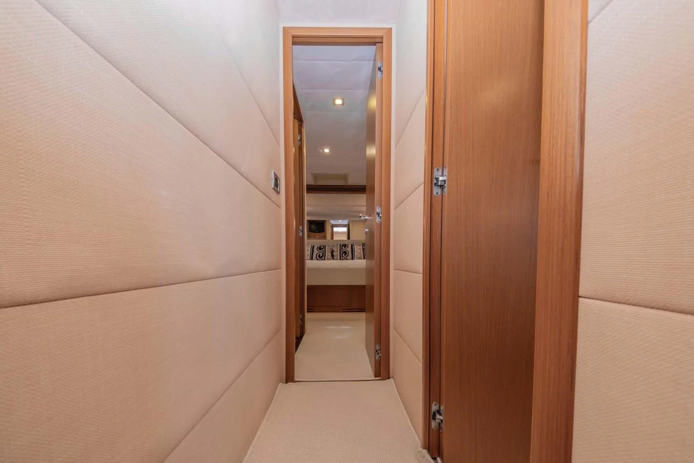 a hallway with a door and a mirror aboard STELLINA Yacht for Sale