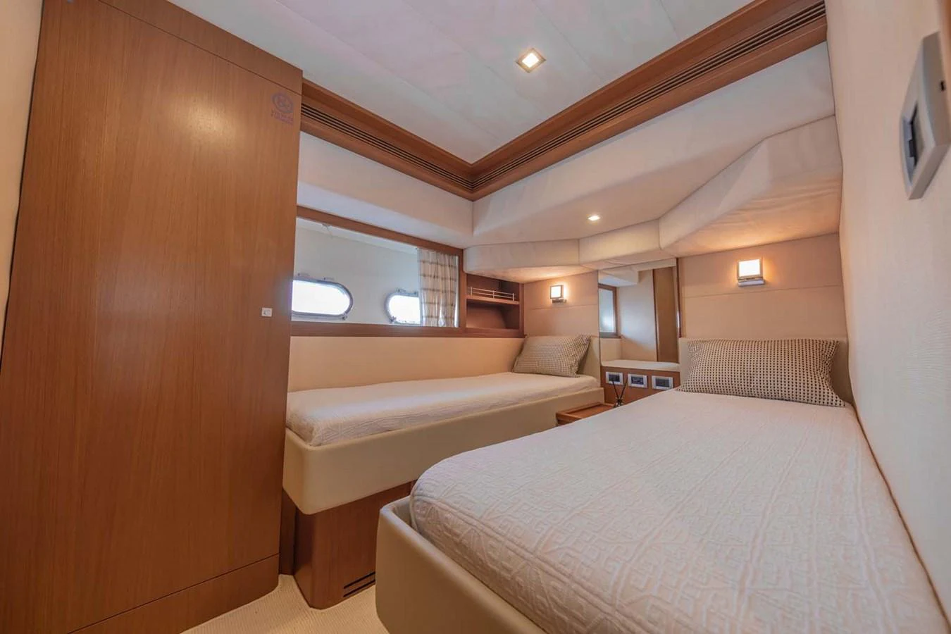 a room with two beds aboard STELLINA Yacht for Sale