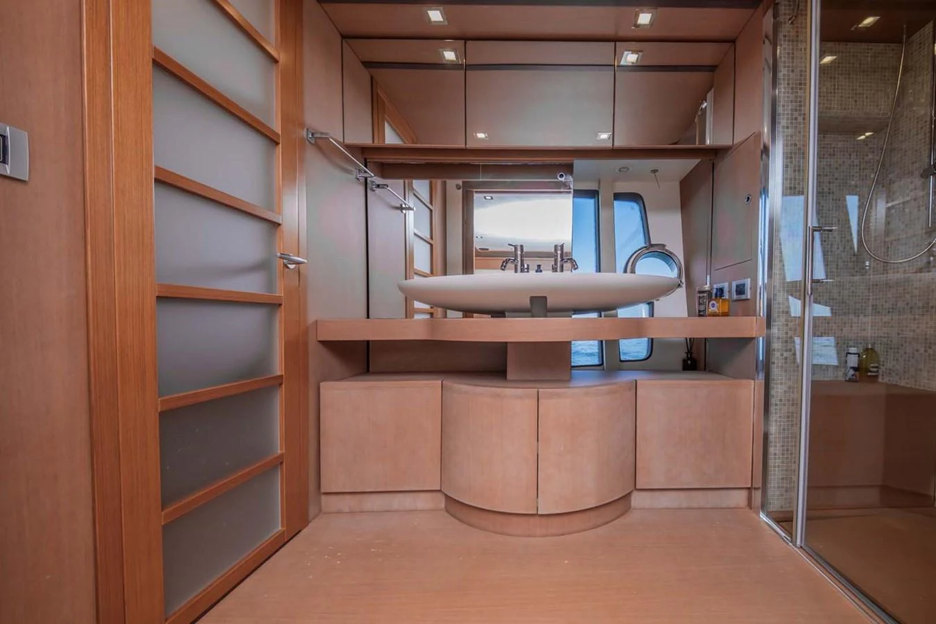 a bathroom with a sink and a mirror aboard STELLINA Yacht for Sale