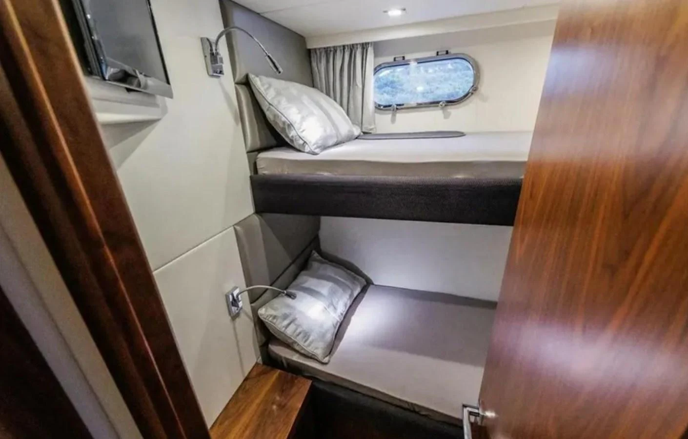 a white car with a window aboard 2 DRUNK Yacht for Sale