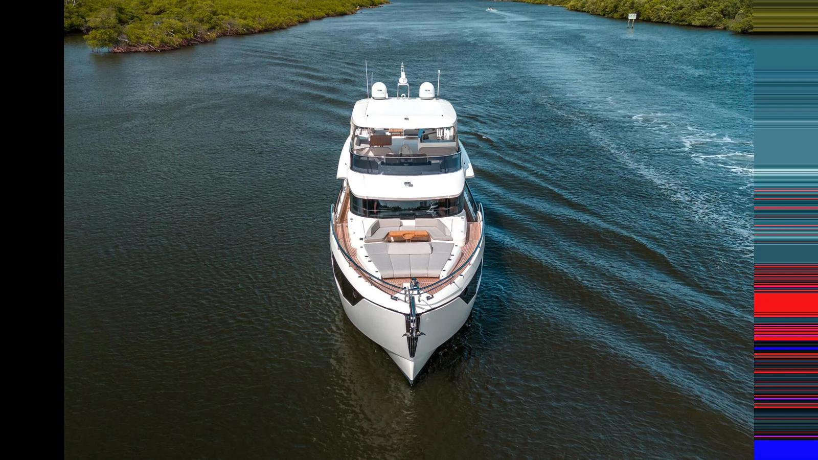a boat on the water aboard OUR TRADE Yacht for Sale