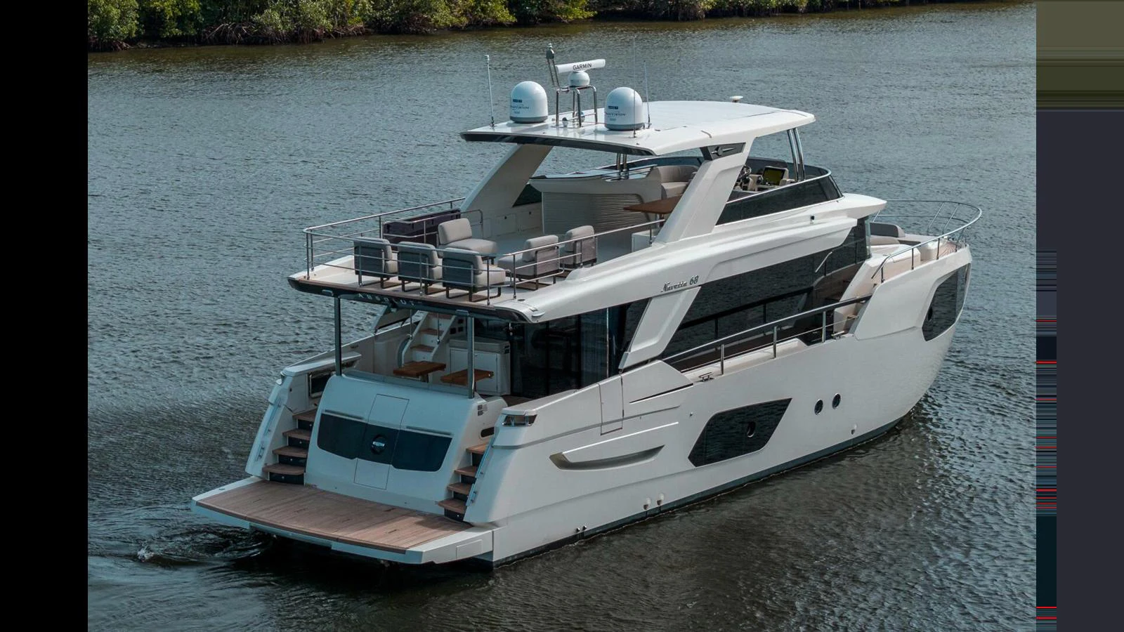 a boat on the water aboard OUR TRADE Yacht for Sale