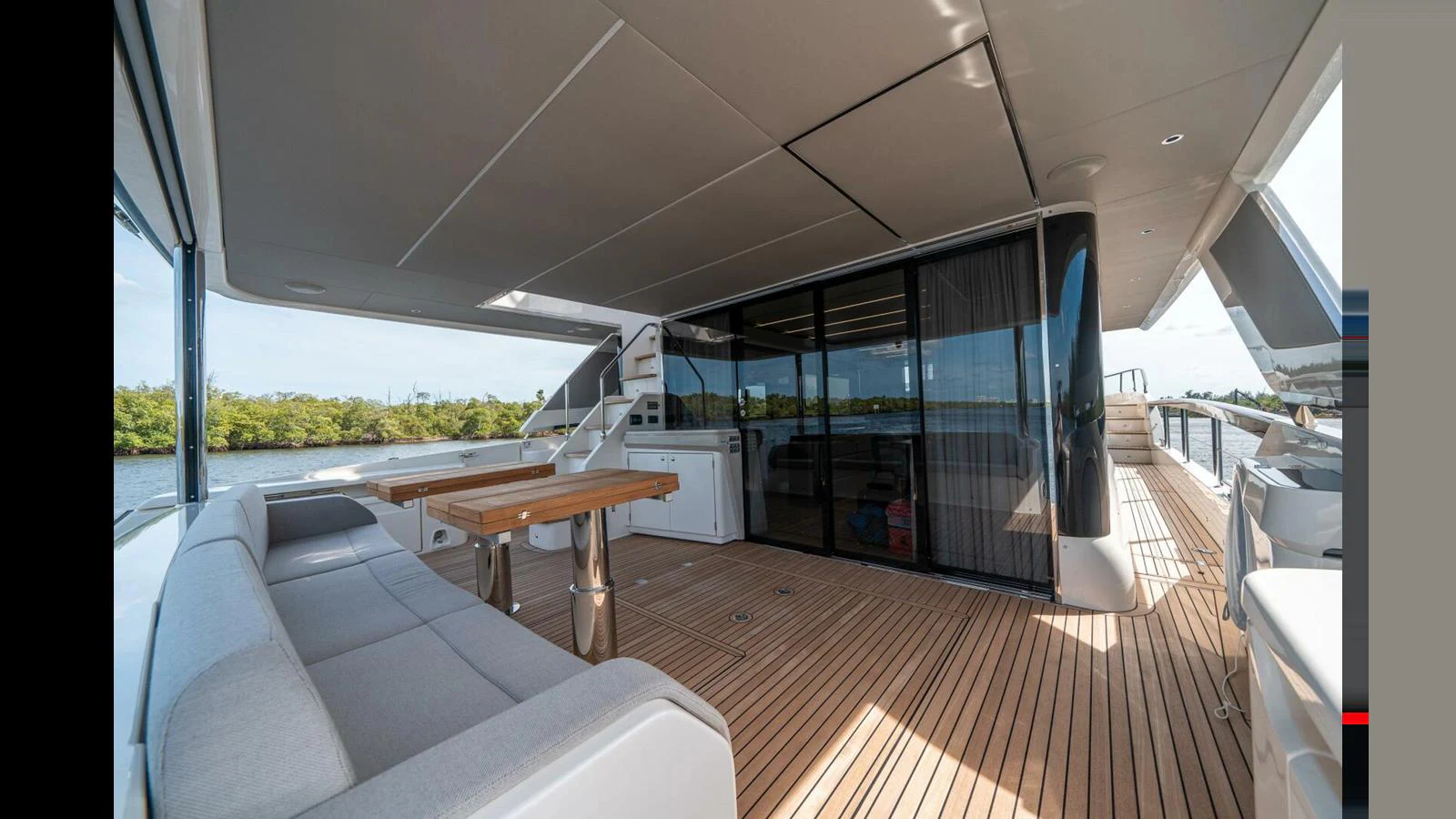 a room with a table and chairs aboard OUR TRADE Yacht for Sale