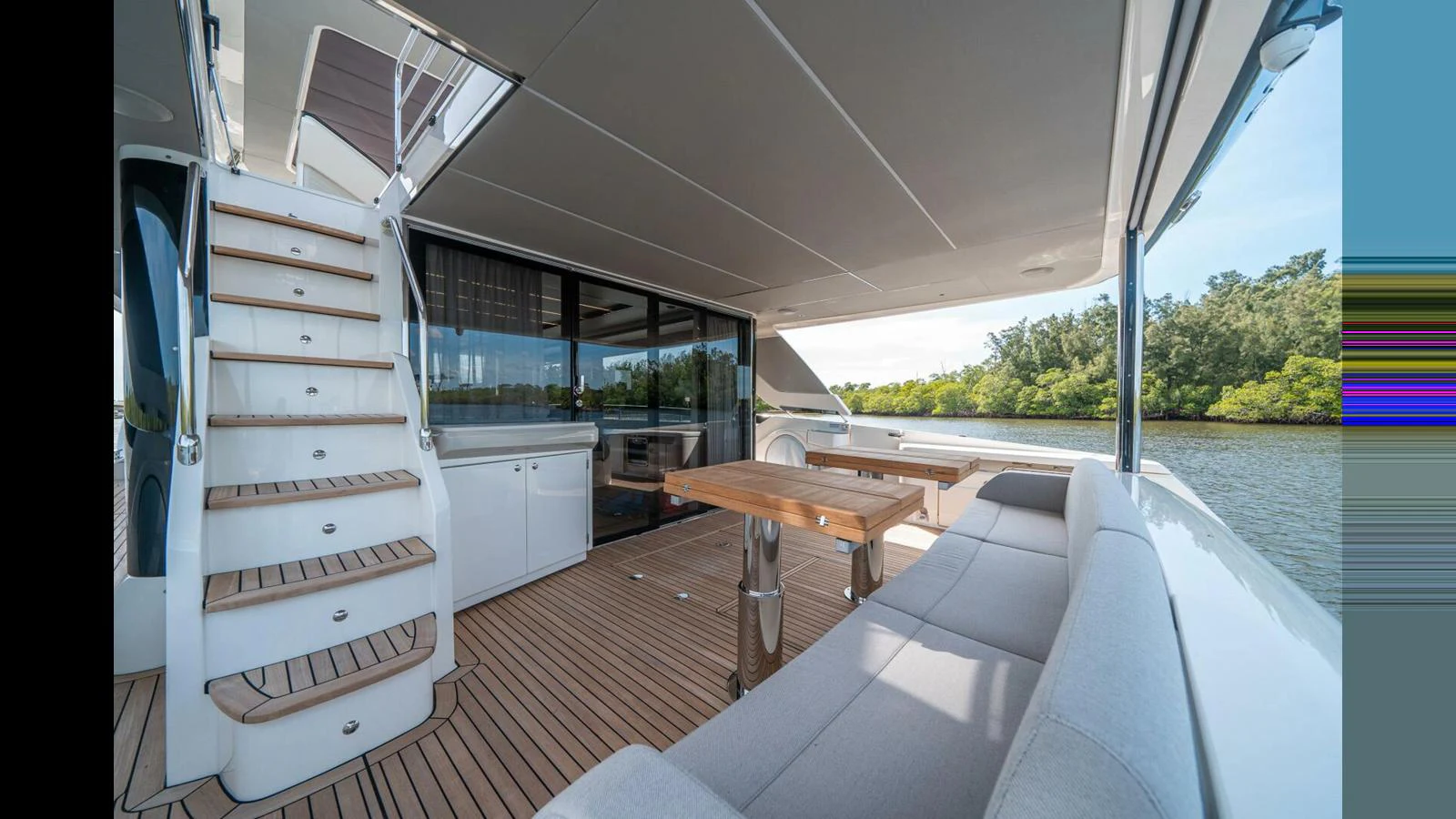 a boat on the water aboard OUR TRADE Yacht for Sale